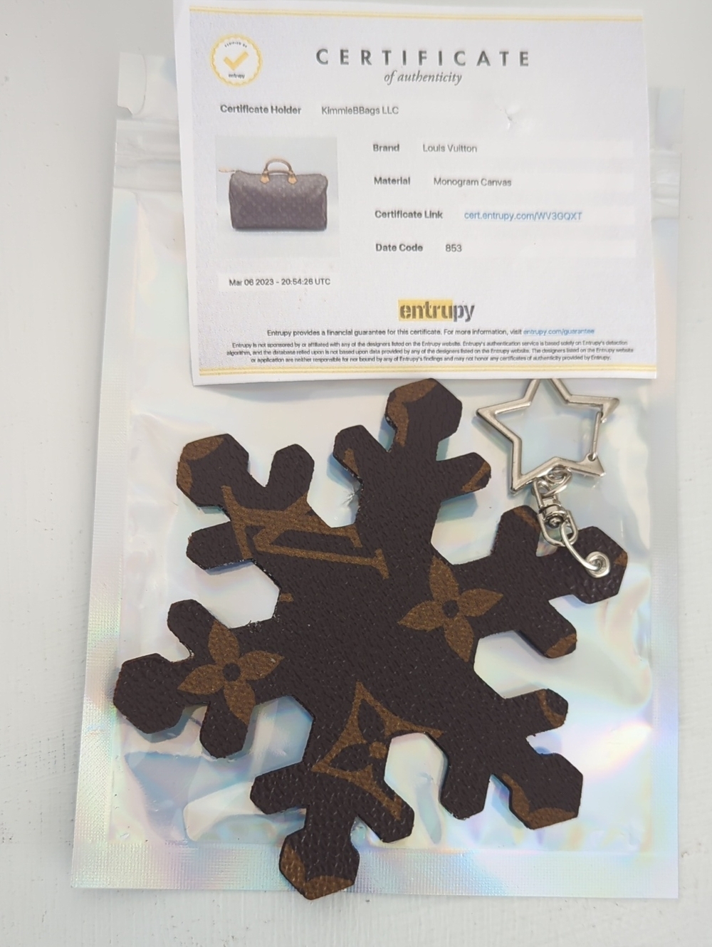 Louis Vuitton Brown Monogram Snowflake Key Charm with Silver Star Clasp COA Incl